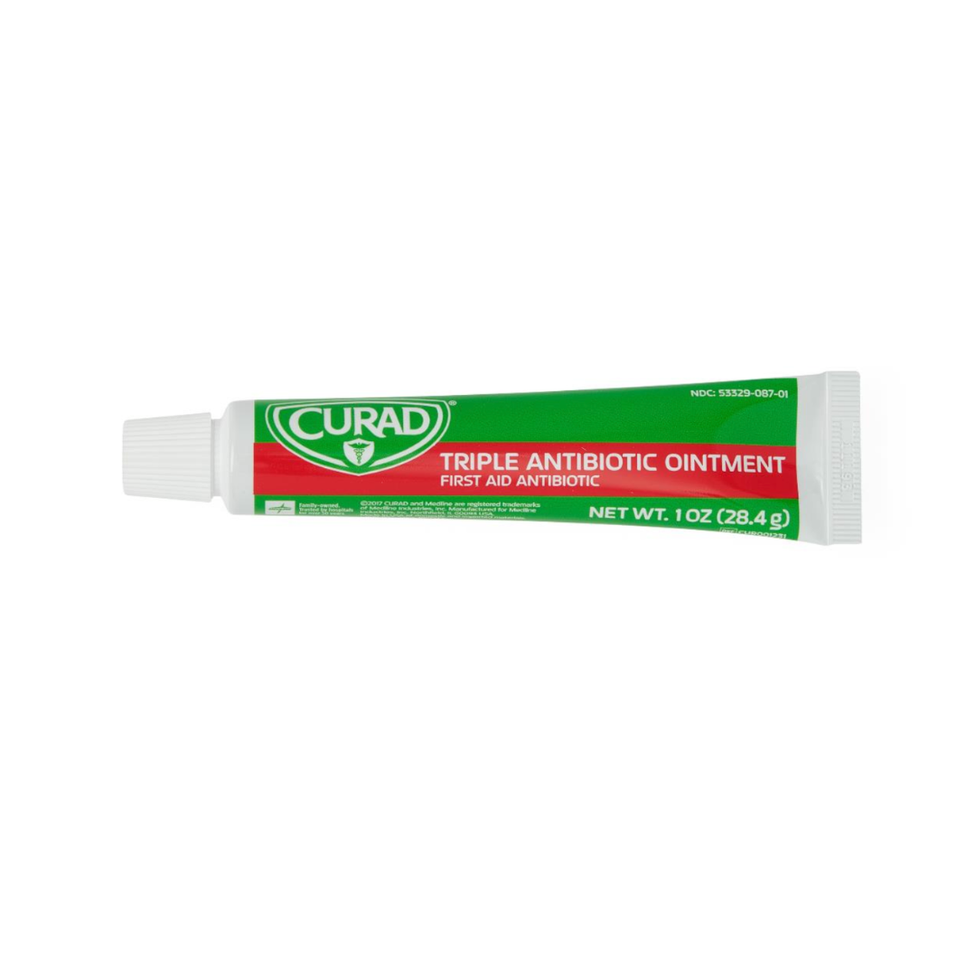 A 1 oz (28.4g) tube of Medline CURAD Triple Antibiotic Ointment provides hospital-quality first aid protection in green and red packaging, labeled as an antibiotic ointment with a white twist cap on the left side.